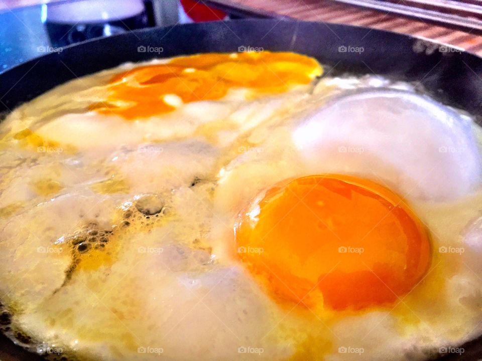 Close-up of eggs being fried