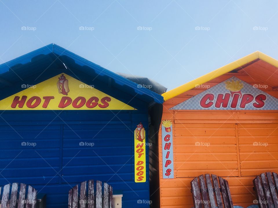 Closed hot dog and chip huts at Fantasy Island amusement park on Canvey Island. In Spring.