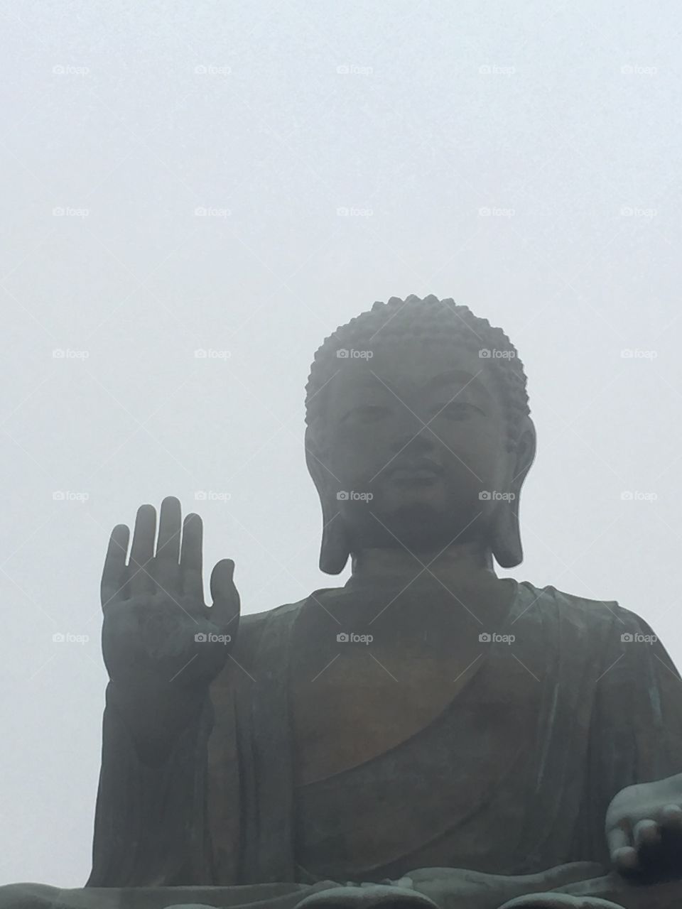 A stormy and cloudy day in Ngong Ping, Lantau Island, The Sacred Buddha in Hong Kong.