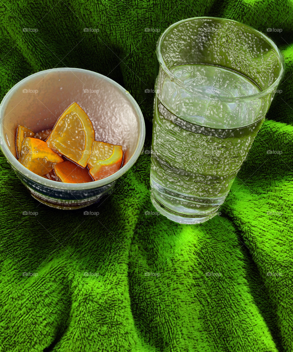Exploring desktop tools and letting my imagination run wild! Used some different filters on this closeup of a glass of water & a bowl of orange segments set on a bright green towel. 