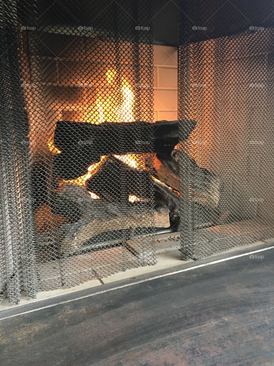 Staying warm by the fire. 