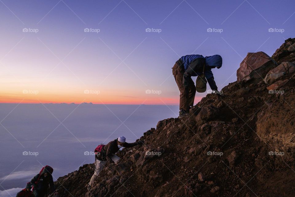 Climb the peak of Mount Slamet, the highest mountain in Central Java, Indonesia. It takes struggle to get to the top and that's the kind of challenge a climber likes.