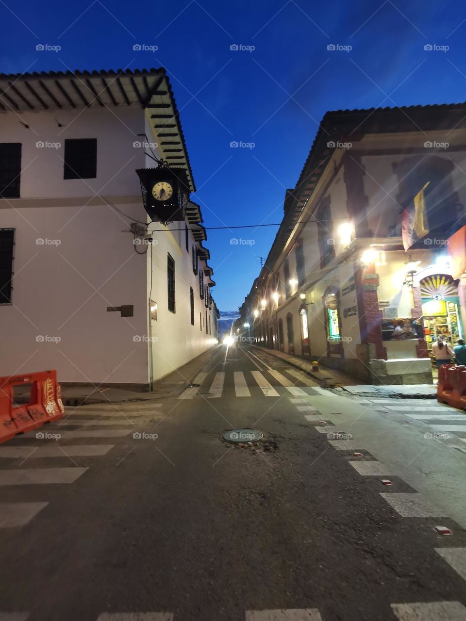 Classical architecture in the city and an old watch