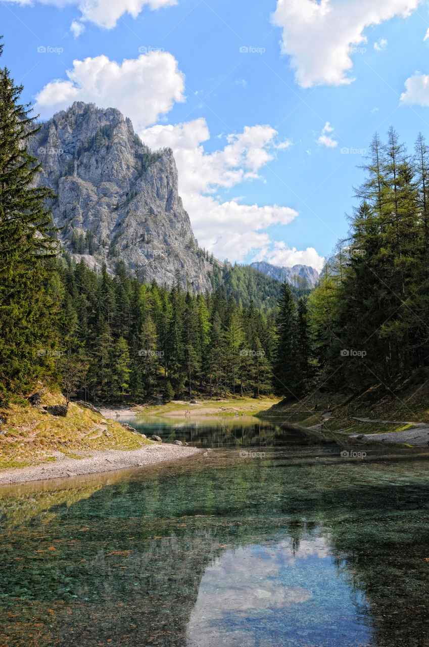 Hiking around the green lake at styria, austria