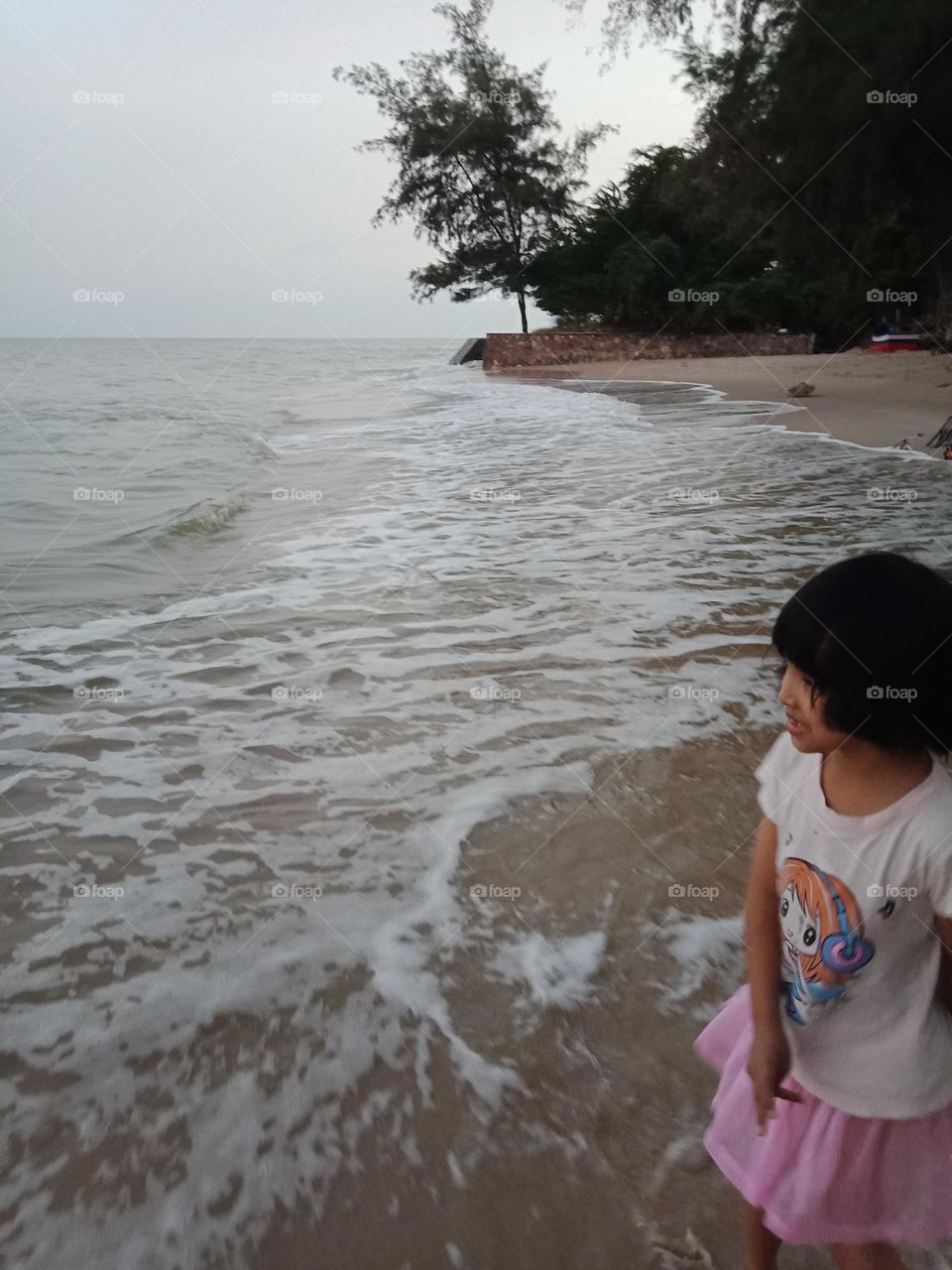 One kid on the beach