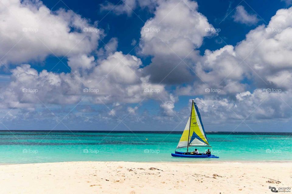 Let's take a ride. Practicing how to ride small catamaran at the beautiful beach of Bay East beach.  This beach is considered one od the top 10 beaches in the world.  Anguilla