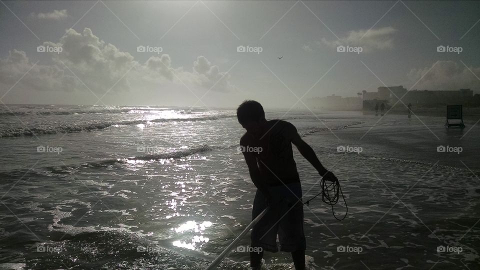 Fisherman casting a net 