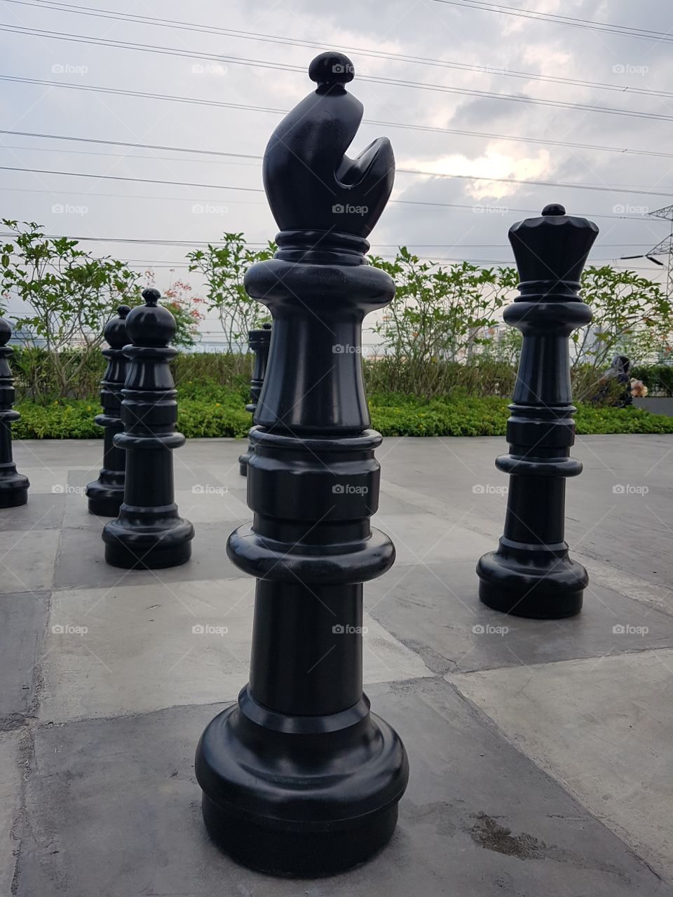 GOMBAK, MALAYSIA - MARCH 23, 2019:A game of bishop-shaped giant chess in a residential park, built by the developer to be played by the local community
