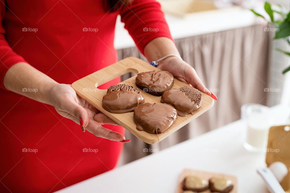 cooking heart shaped cookies at the kitchen