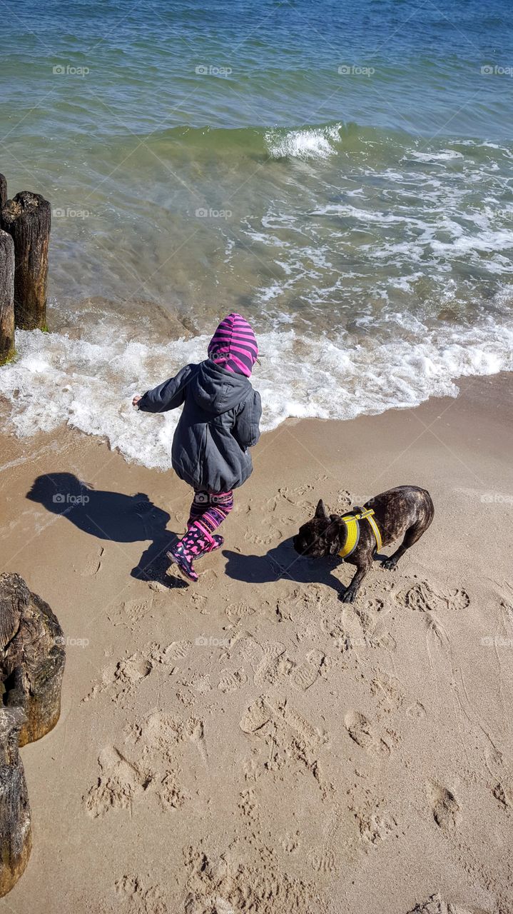 Julia and Peppa playing on the beach 

