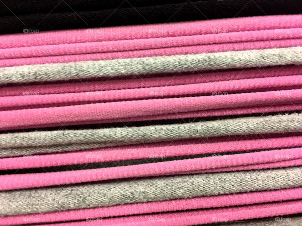 Stack of pink textiles