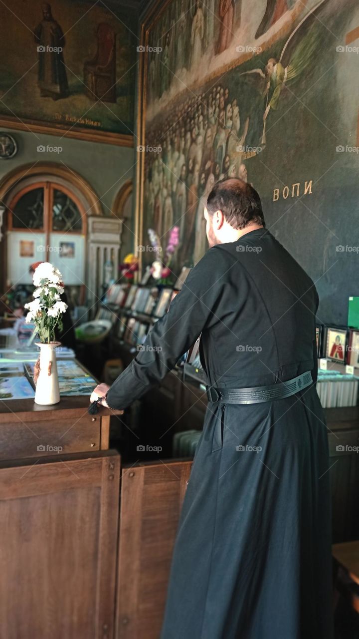 the holy father in the church shop