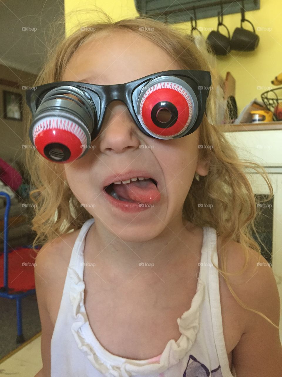 Close-up of a girl wearing funny goggles