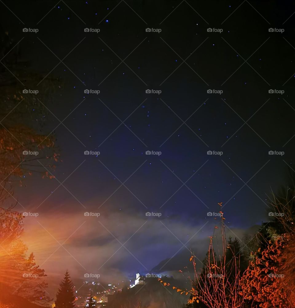 City landscape with stars on the sky