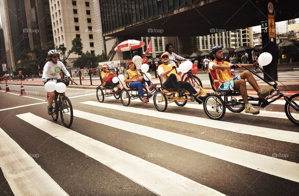 Group of cyclists in the city street