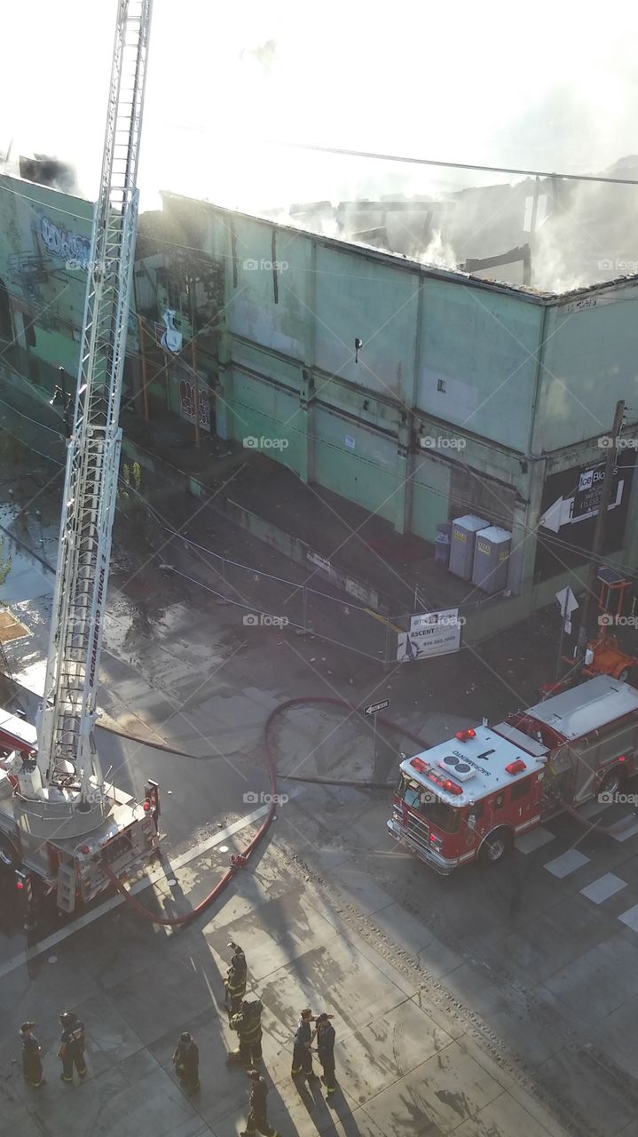 local heroes. fighting a building fire in downtown Sacramento
