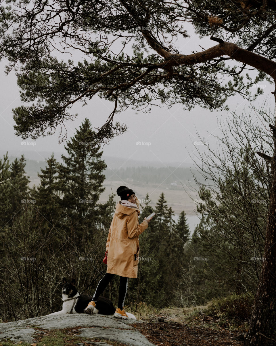 nature in russia / woman  and a dog in fall