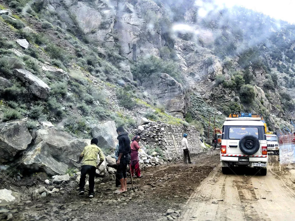 Men at work on road