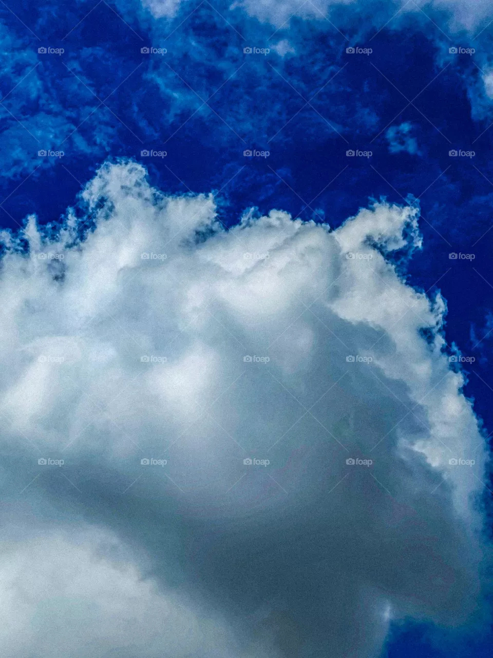 I want to show white clouds and blue sky in this photo.  The sky looks very beautiful with clouds and blue sky.