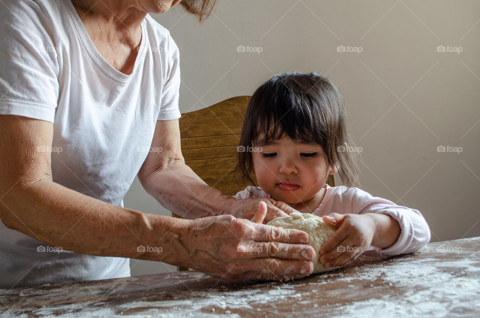 Preparing natural leaven bread with the family.