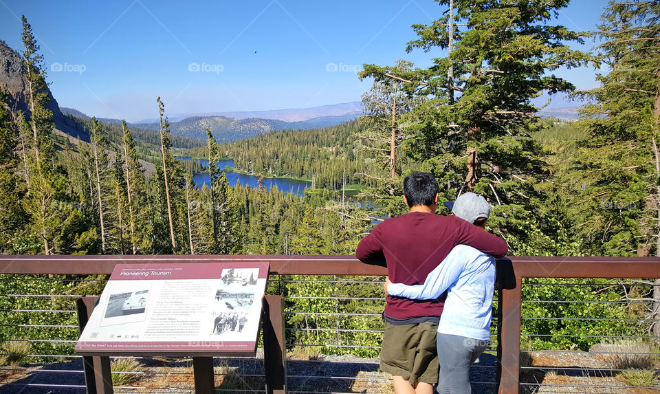 Couple enjoying the view of twin lakes, travel, tour