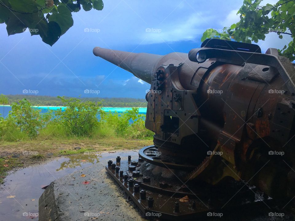 Rustic Antique U.S. WWII Cannon Memorial on Tropical Bora Bora Main Island, French Polynesia 