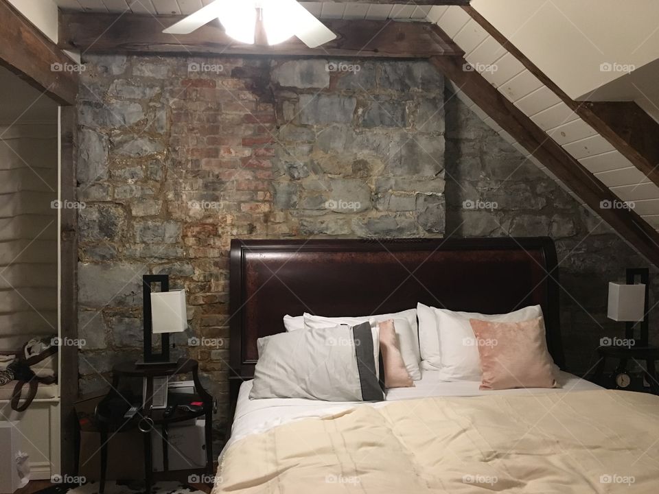 Old stone brick walls in a beautifully decorated one bedroom suite.