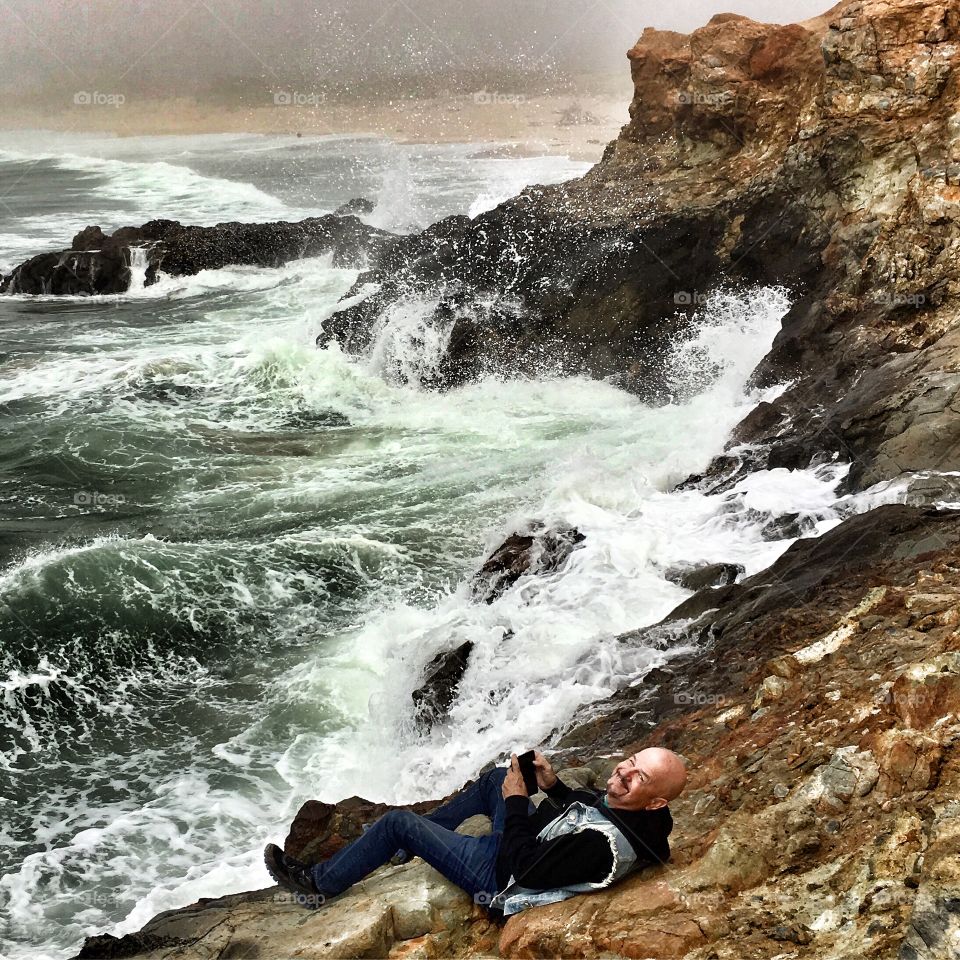 Joy in the midst of crashing waves! My husband in his element! 
