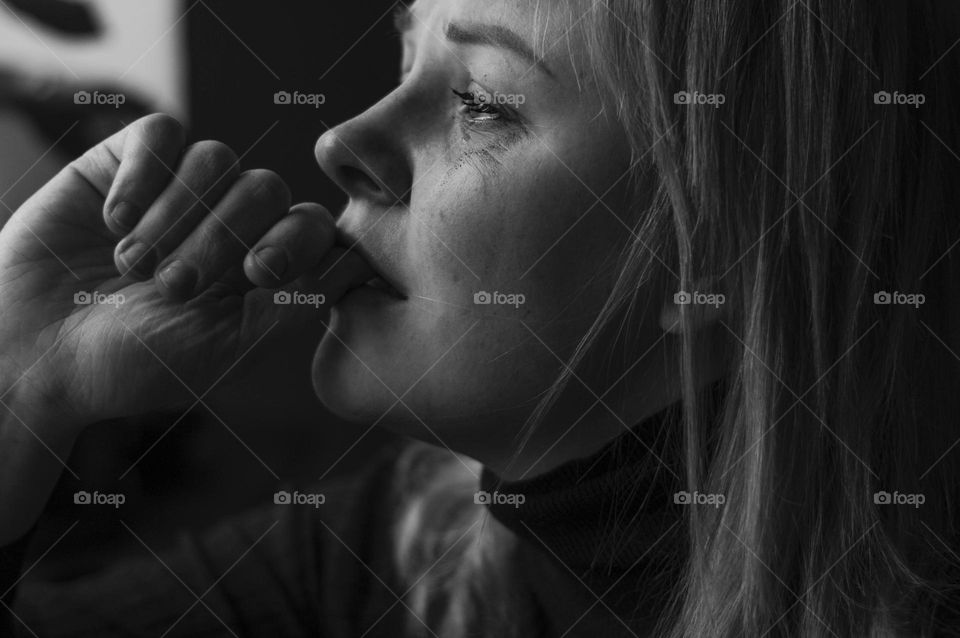 woman crying and feeling sad.