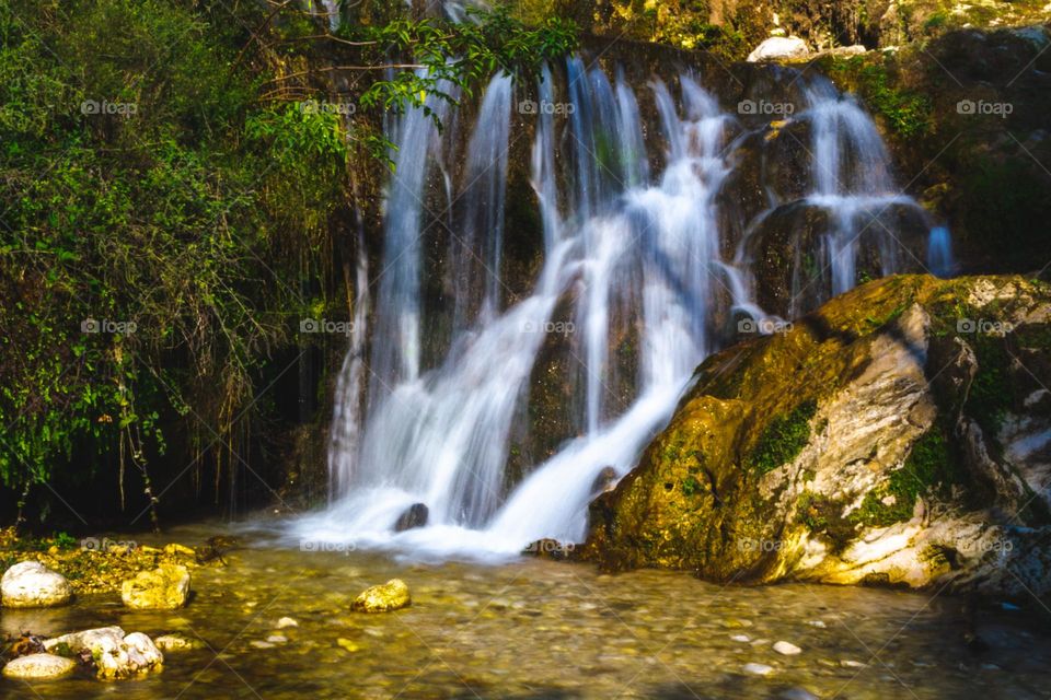 Waterfalls are always a favorite thing to capture. Especially with slow shutter speed. I find something exceptional in these pictures that the water's flow literally draws lines.
