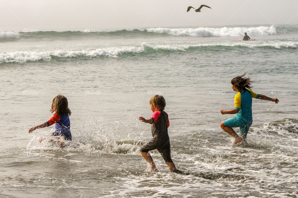My fav moments are primarily times with my family. Some of my favourite moments involve catching photos of them playing. We spend a great deal of time at the beach & in the water & this photo was when we just arrived. Getting wet is first!