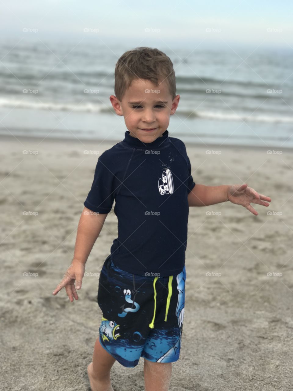 Portrait on little boy at beach