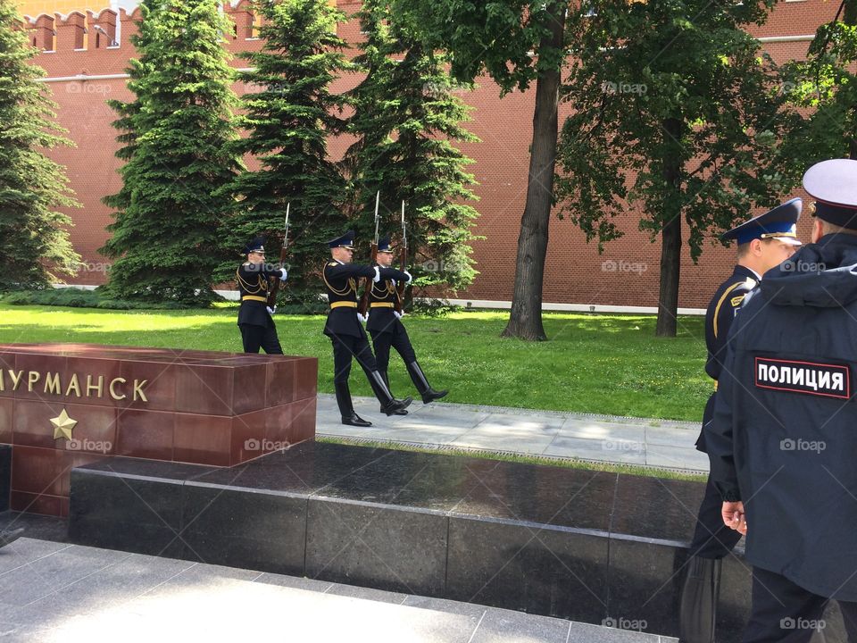 Three soldiers on charging guard ceremony 