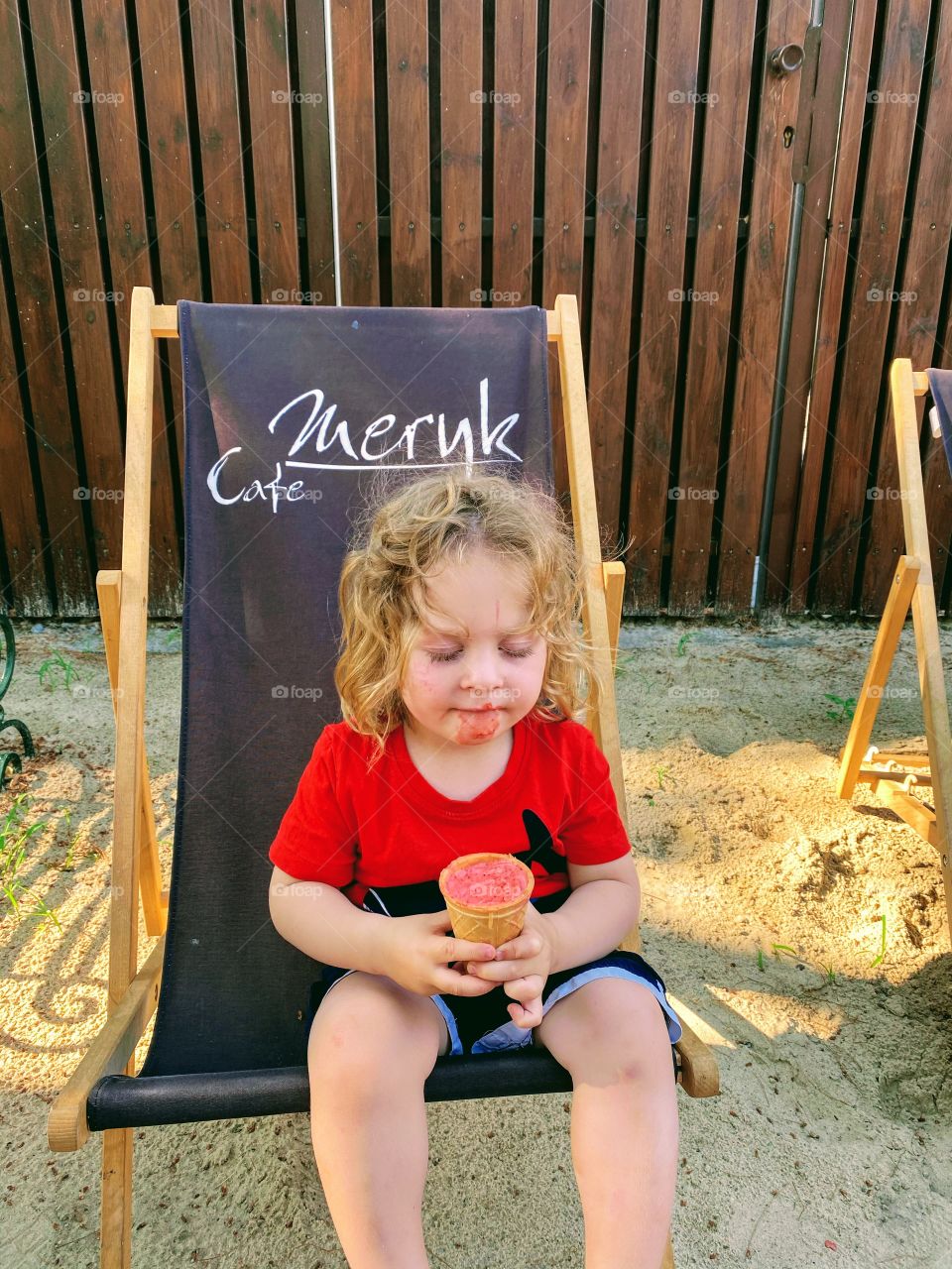 Boy eating ice creams 