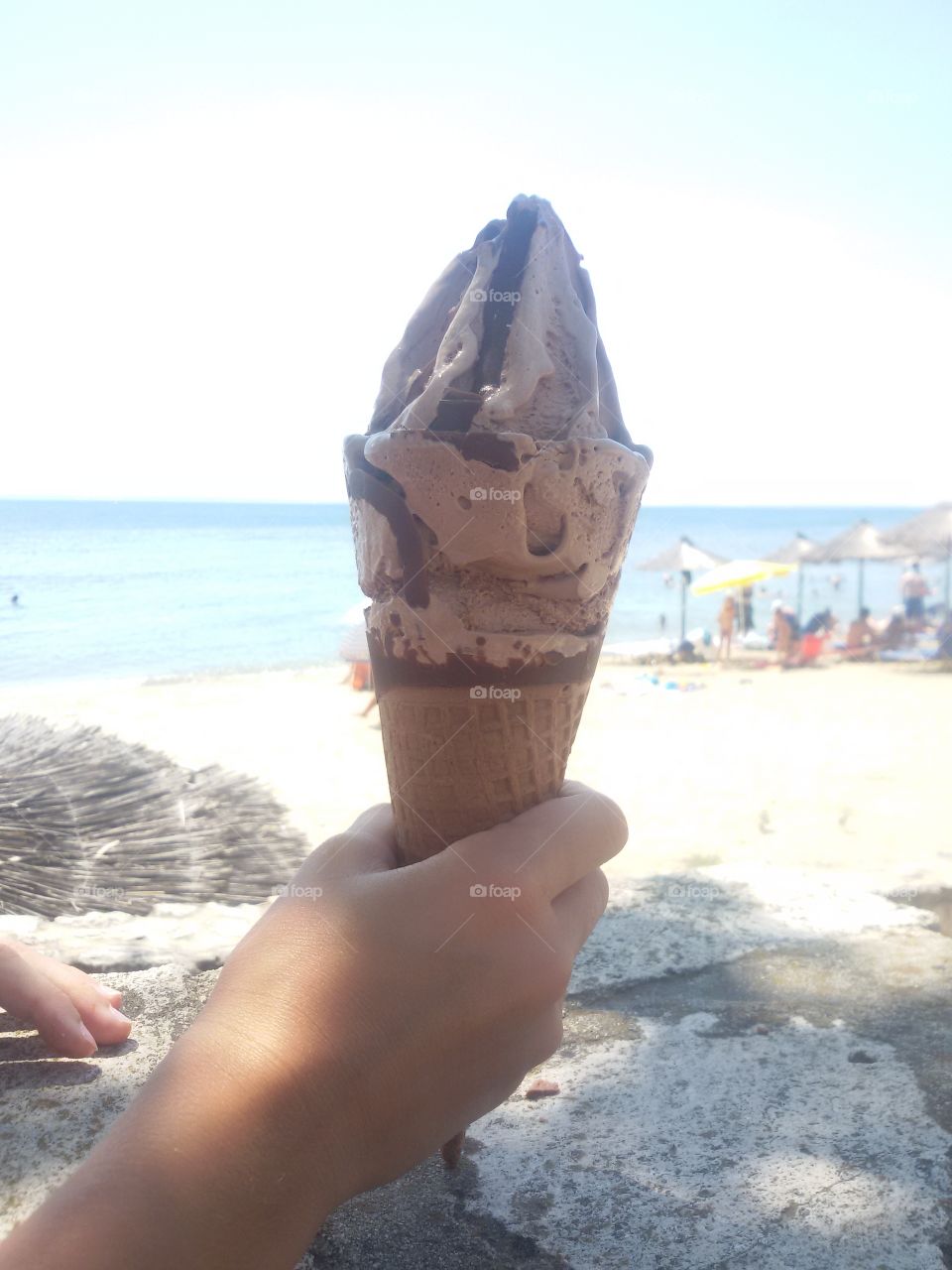 Chocolate ice cream on beach