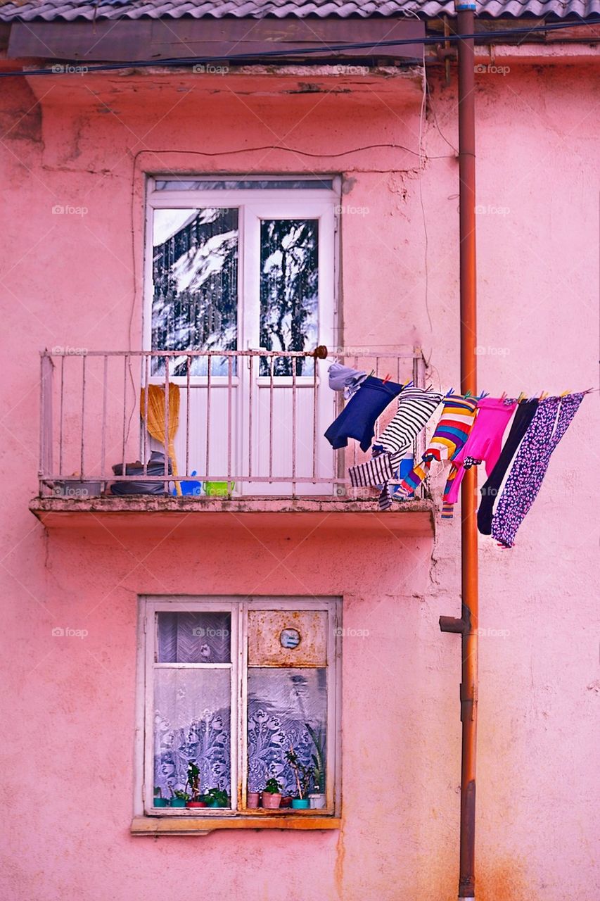 Drying clothes on balcony