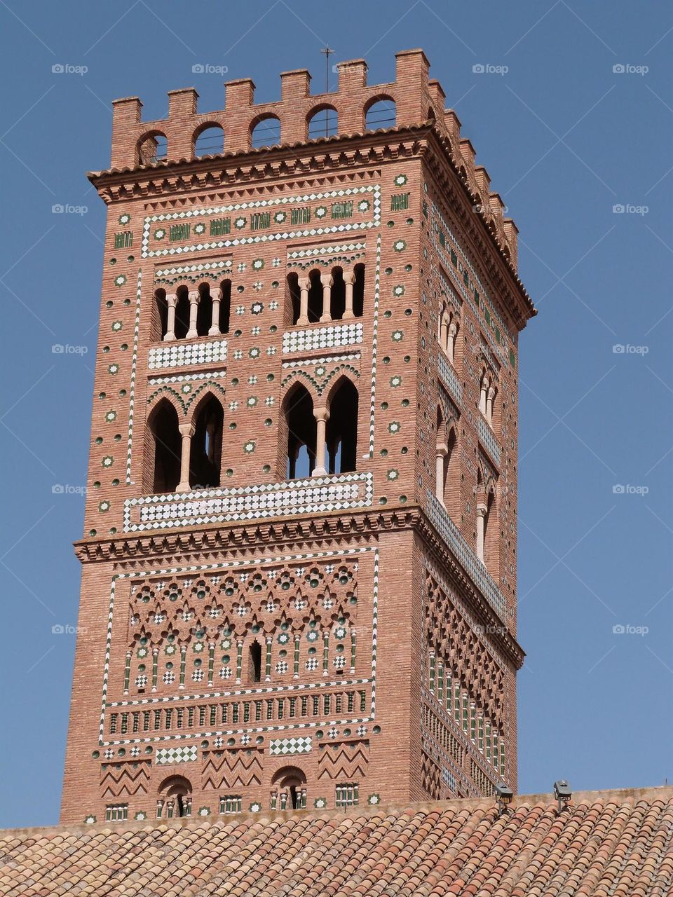 Gothic red stone tower with decoration in the Spanish city of Teruel.