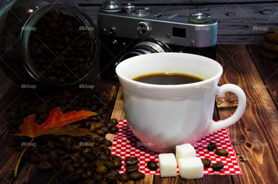 coffee been still life on wooden background