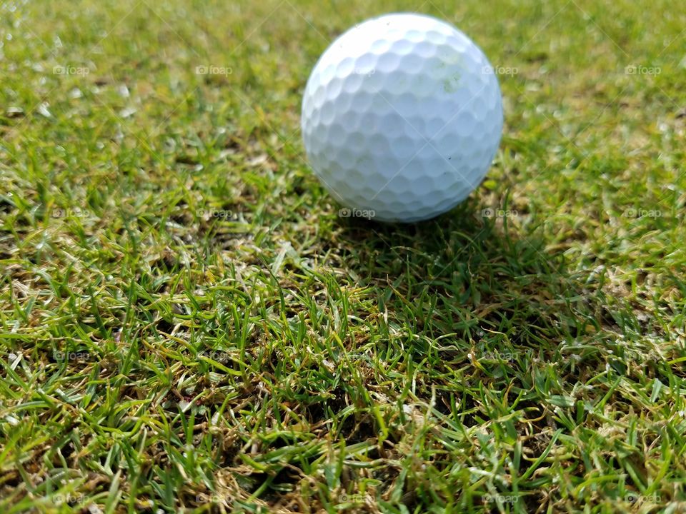 Golfball offset in the grass