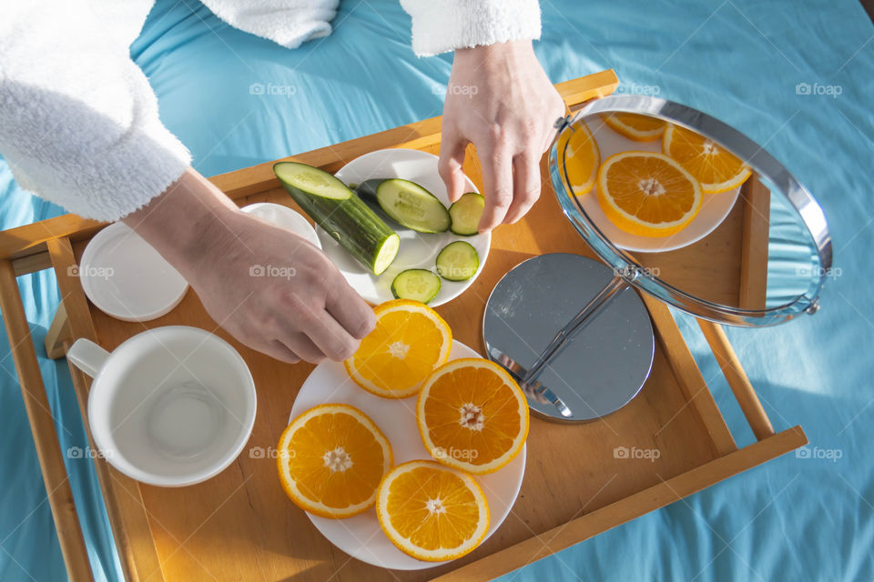 Man eating breakfast with vegetables and fruits