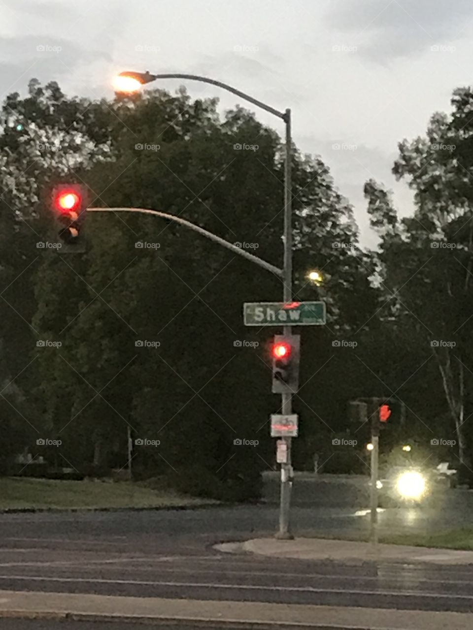 Street lights, lamp and sign.