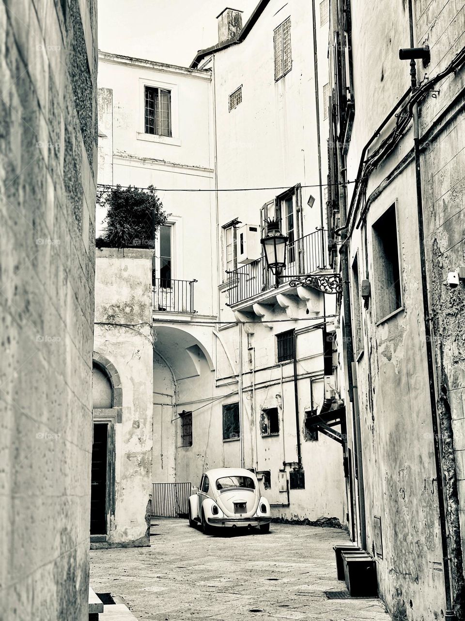 Classic 1970s VW Beetle in the old town of Lecce, Puglia, Italy.