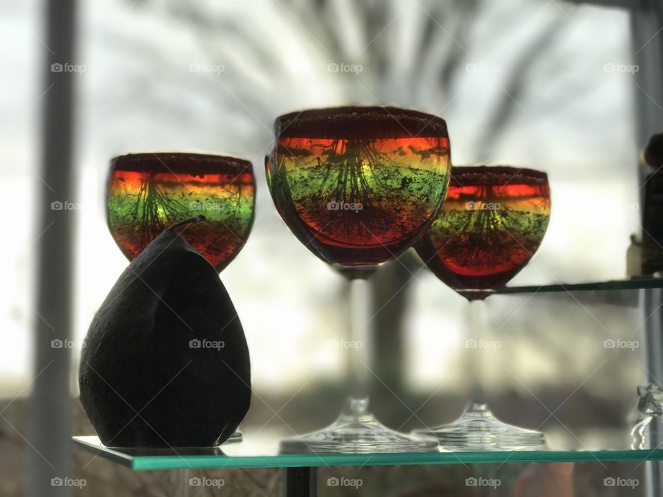 Dessert - view through colorful jello;  Image horizontally mirrored in the glass