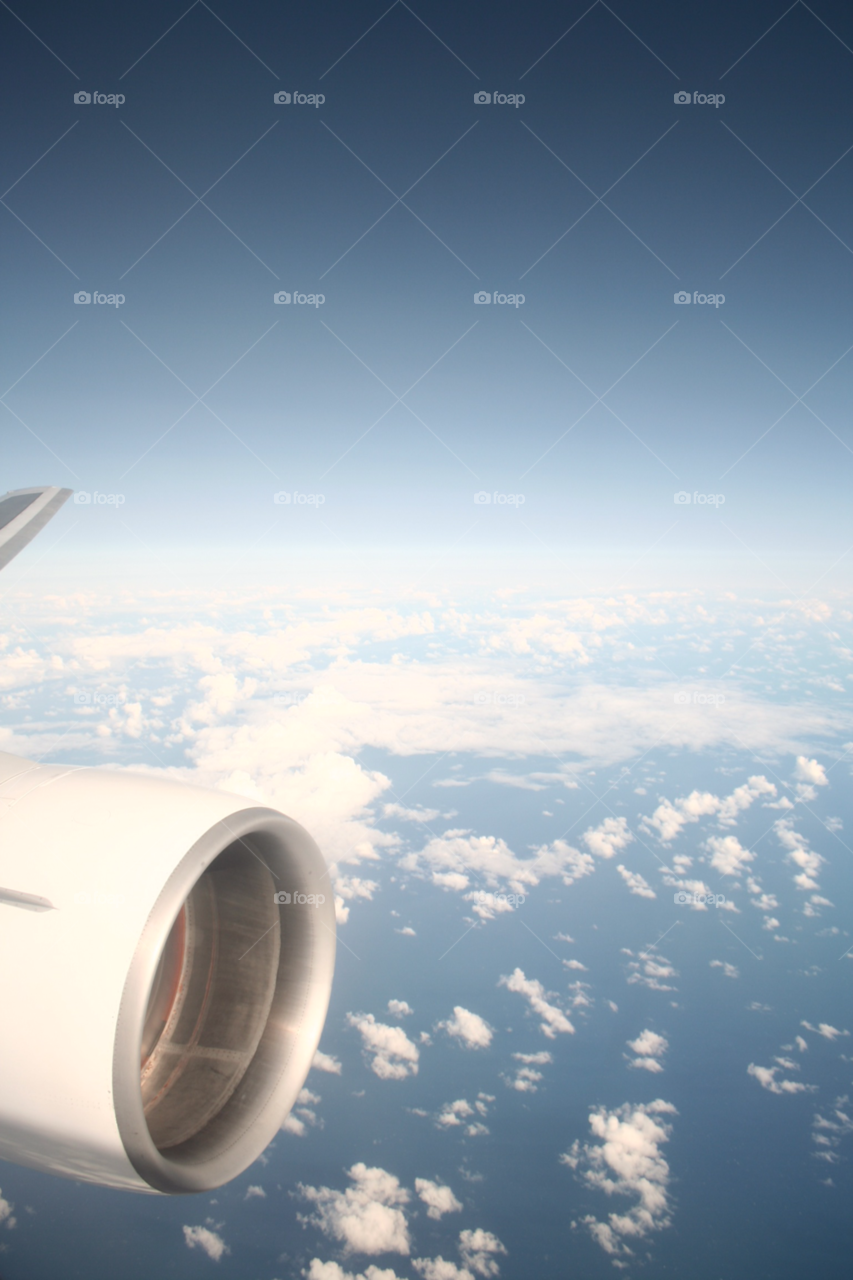 clouds plane flight landing by adrianocastelli