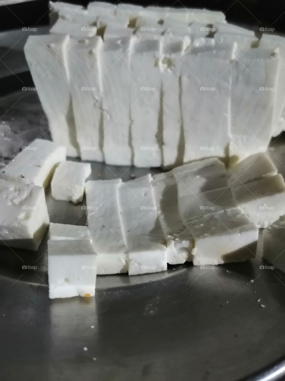 Delicious cheese slici on plate