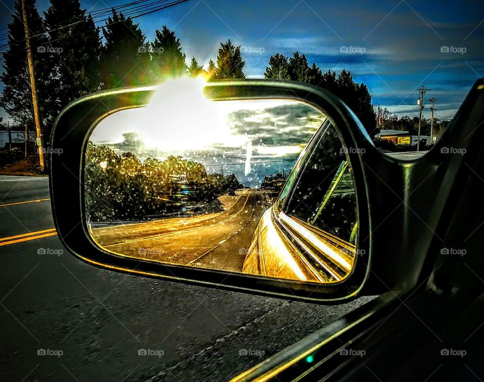 look in the rearview mirror and see the Cross of Christ