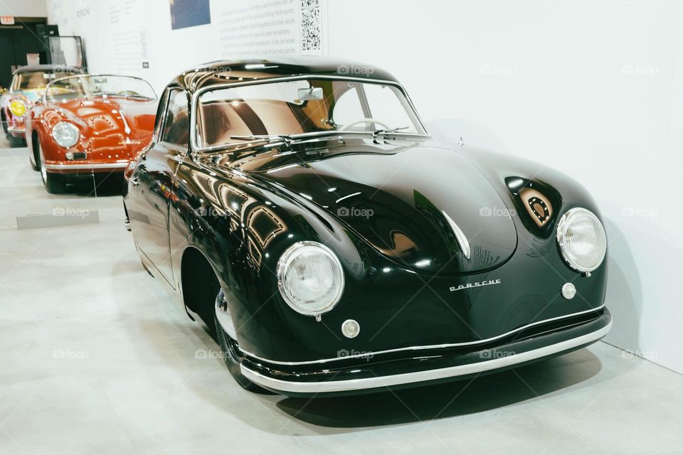 Black porsche.  Classic car.  The car that started it all.