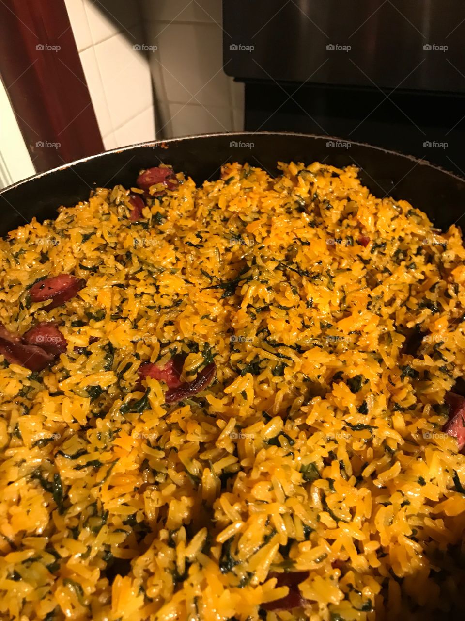 Andouille Sausage, spinach and yellow rice one pot
