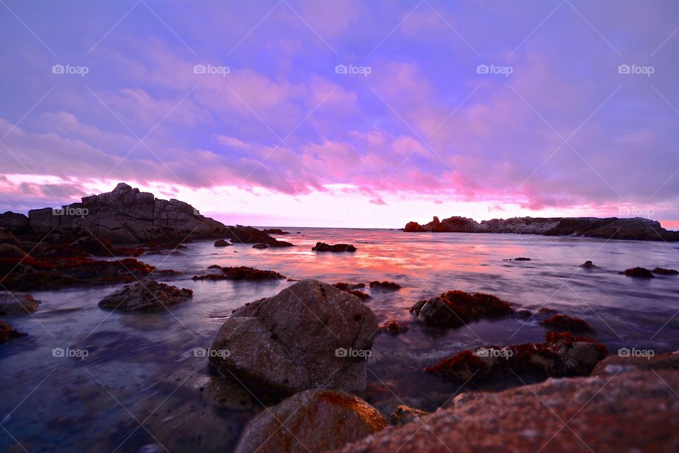 Breathtaking sunset at the shores of Monterey in California 