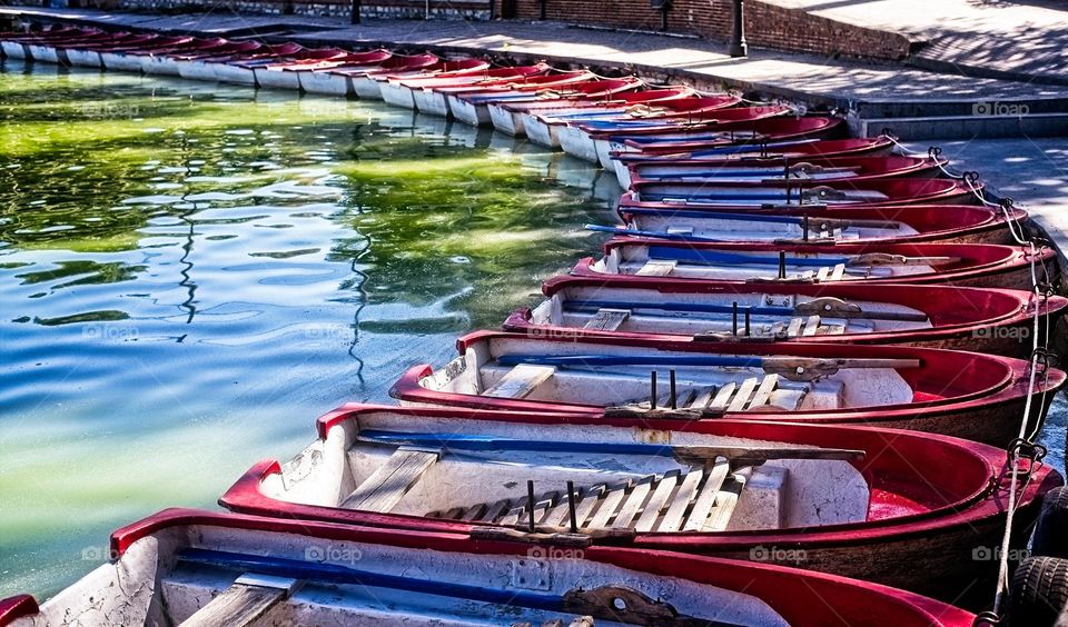 Boats in a row in the pier